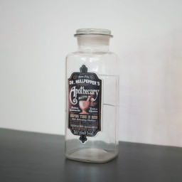 Bote de farmacia cuadrado