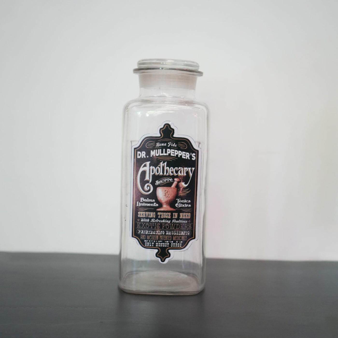 Bote de farmacia cuadrado