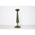 Candelero de bronce